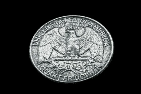 Reverse of a circulated U.S. Washington quarter on a black background, eagle and motto visible.